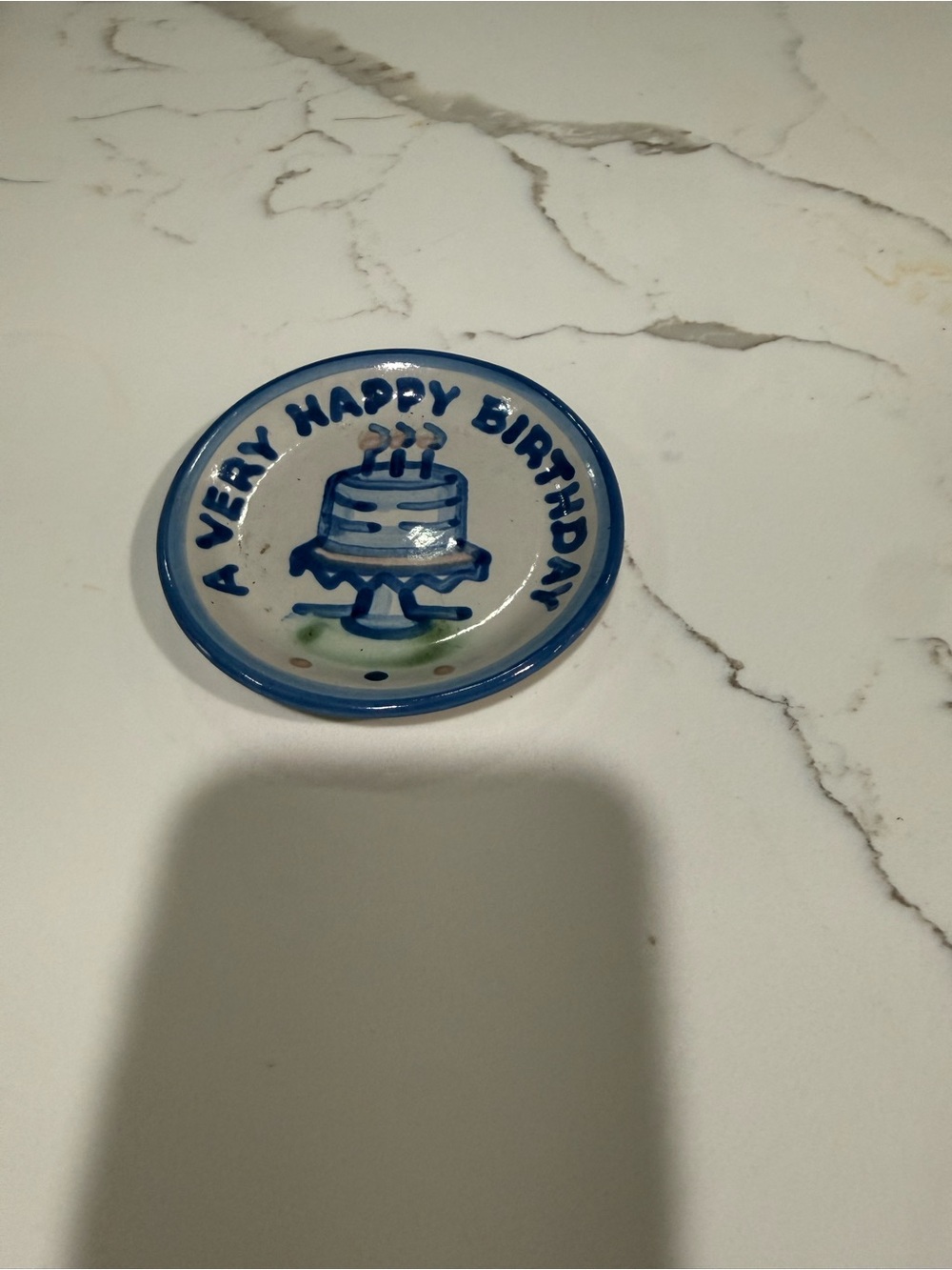 M.A. Hadley “Happy Birthday” signed butter pat/Coaster (4 in.)